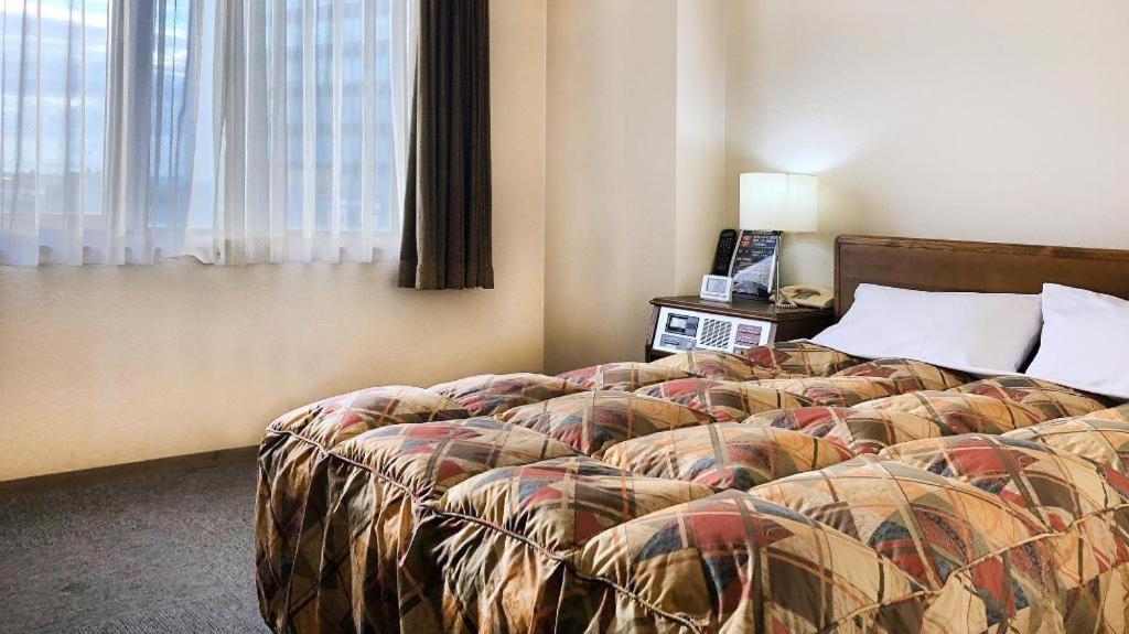 Neyagawa Trend Hotel Osaka Bagian luar foto