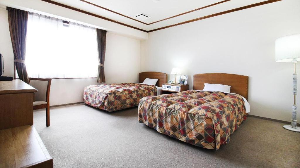 Neyagawa Trend Hotel Osaka Bagian luar foto