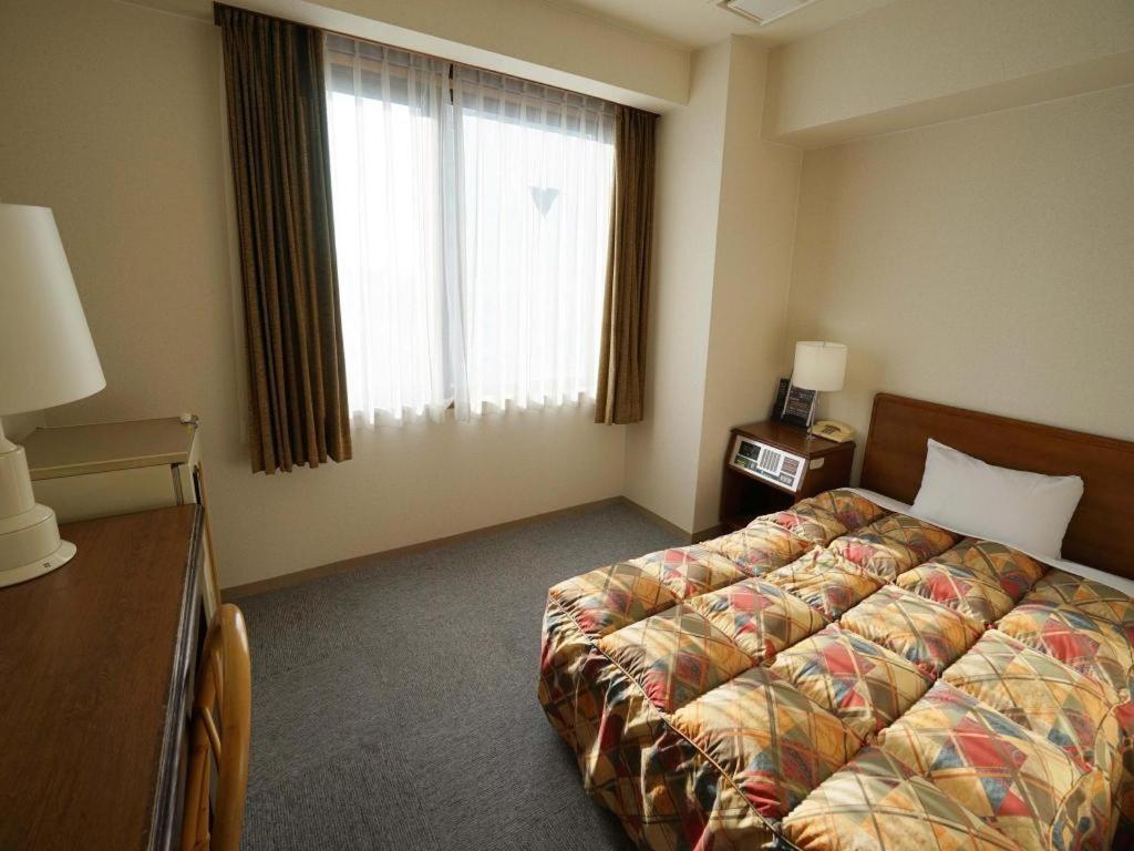 Neyagawa Trend Hotel Osaka Bagian luar foto
