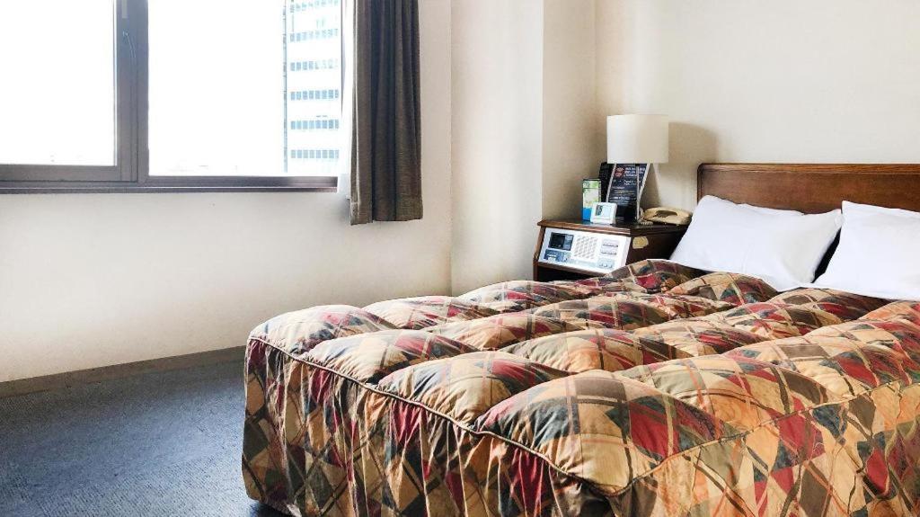 Neyagawa Trend Hotel Osaka Bagian luar foto